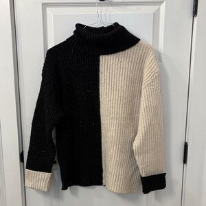 Two-Tone Black and Cream Turtleneck Sweater